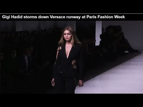 Gigi Hadid storms the Versace runway in an asymmetrical floral 